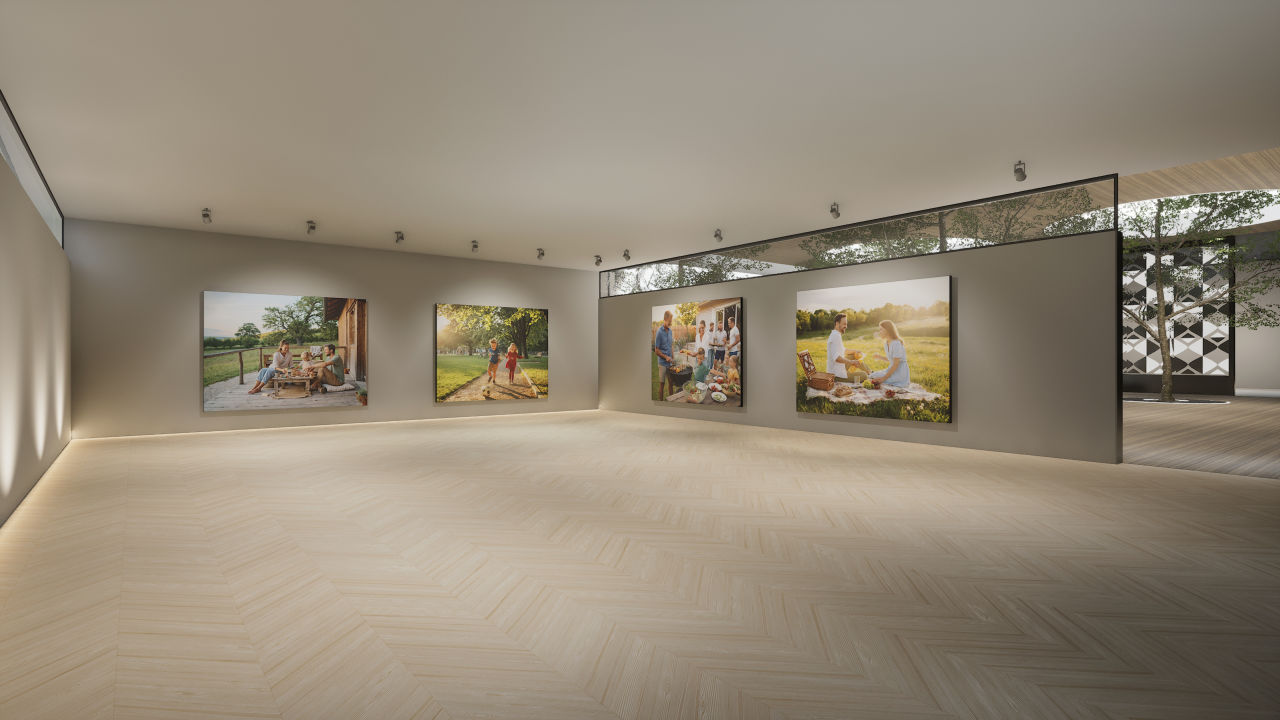 Vue générale de la salle finale d'une galerie immersive de photographies, pensée pour le partage des souvenirs et le retour au calme.